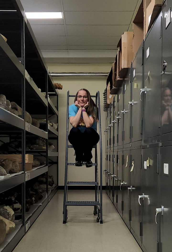 photo of Dr. Melissa Pardi in the geology collections storage
